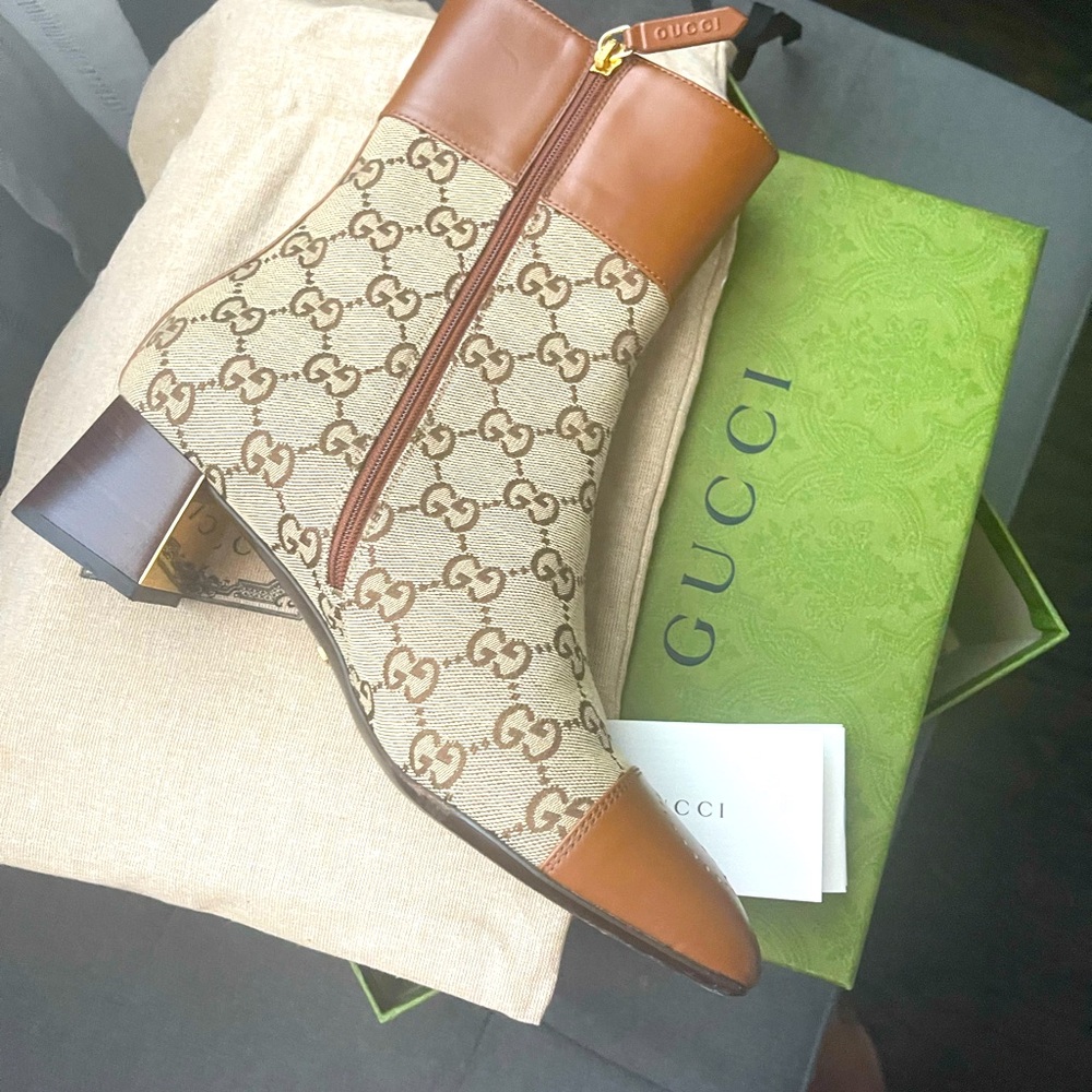 Gucci boots original use only for 3 hours come with box and bag brown leather .